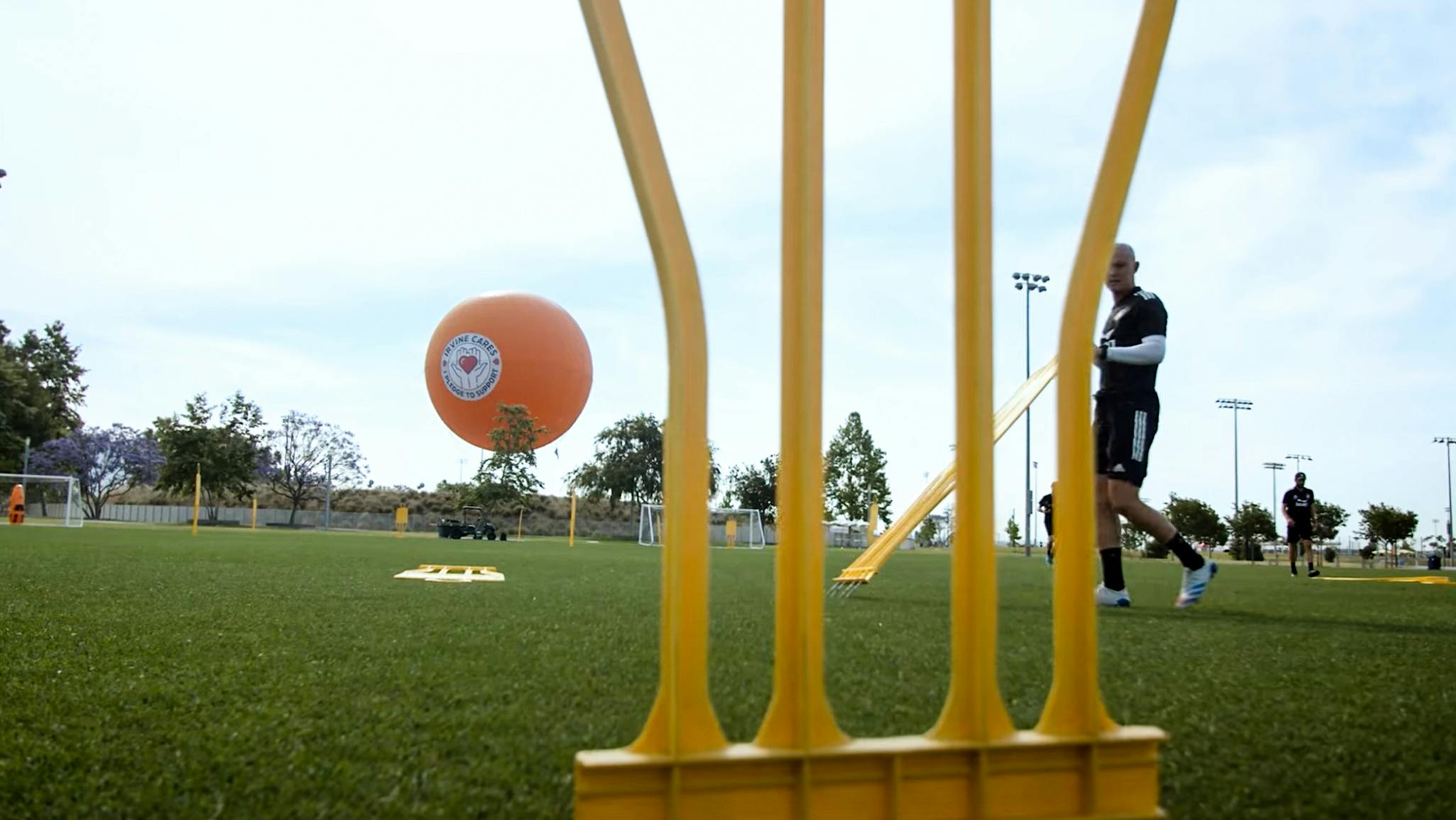 Photo from soccer training sestion, picture is taken through soccer mannequins